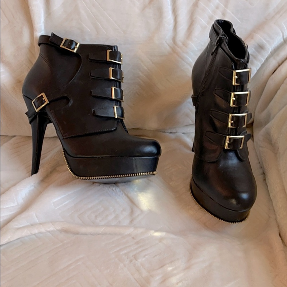 SOLD! Black ankle boots with buckles.